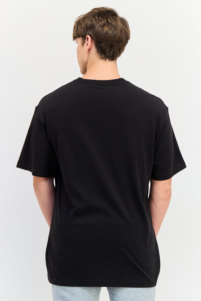 PUMA Men Relaxed Fit Short Sleeve Downtown Badge Outdoor T-Shirt, Black - Image 4